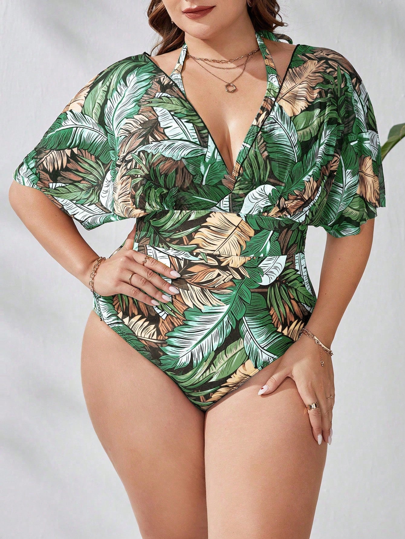 Maiô feminino com mangas transparentes caídas